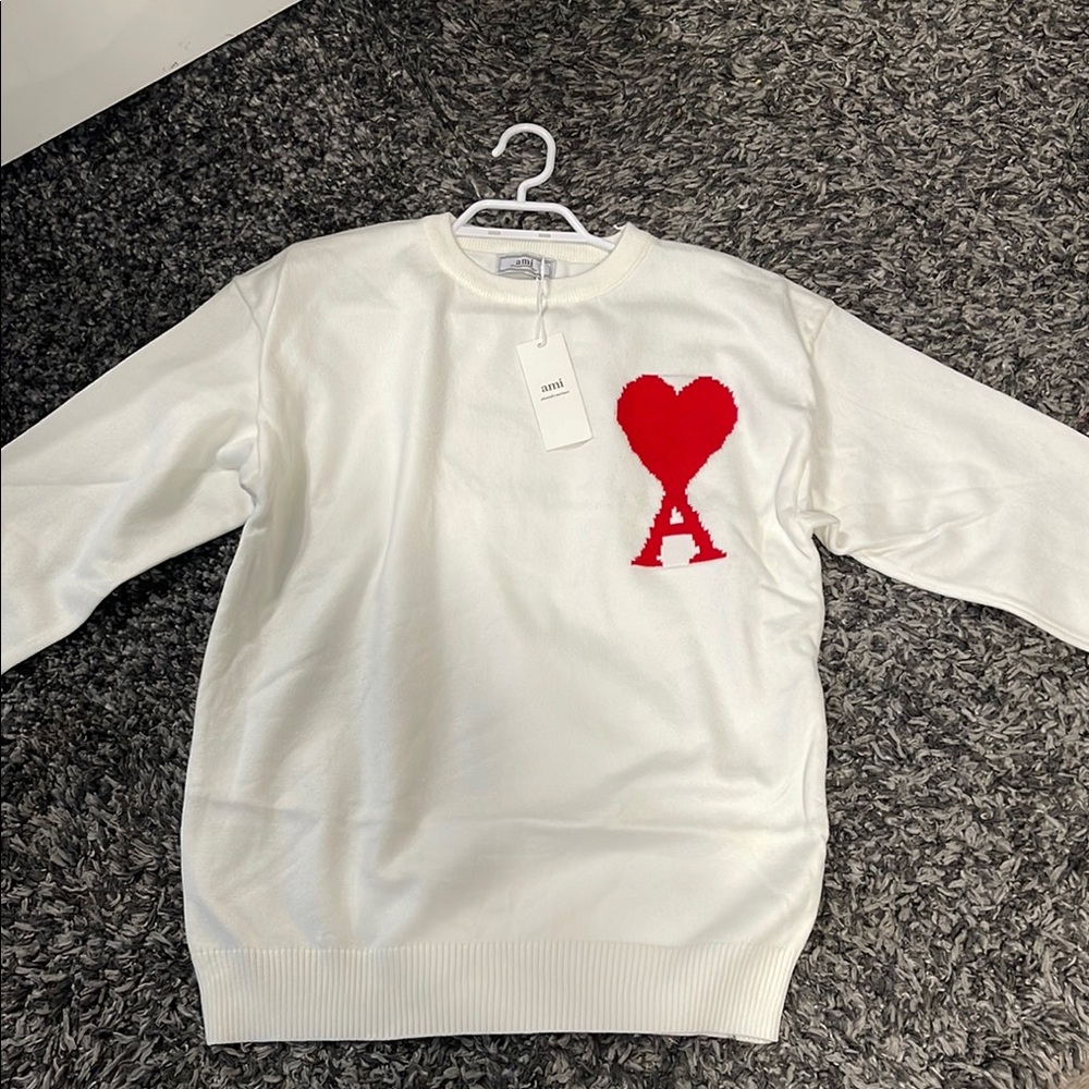 White Sweater with Red Heart Logo